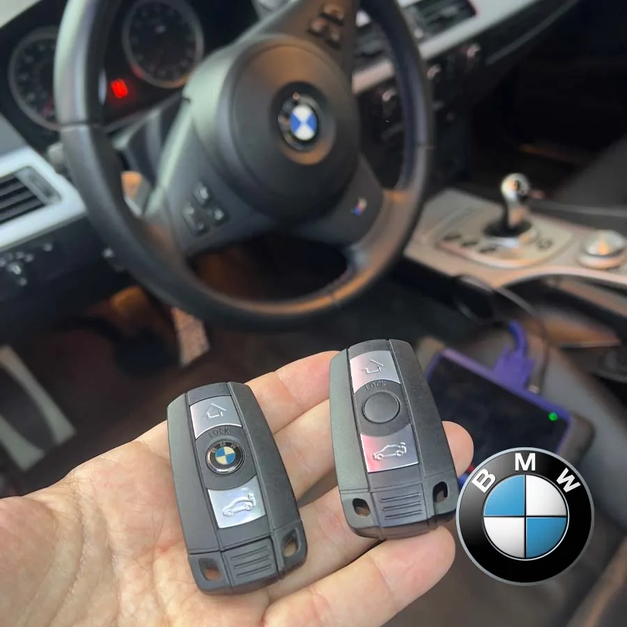 Two BMW comfort access keys made for a BMW