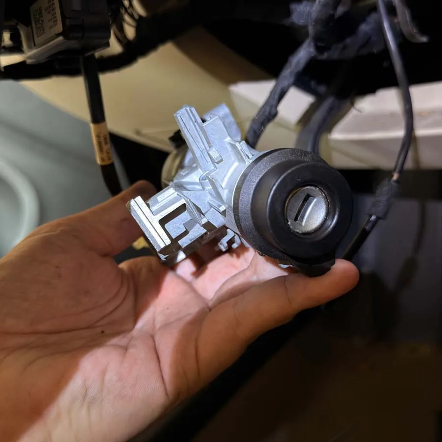 Worn ignition cylinder removed for repair